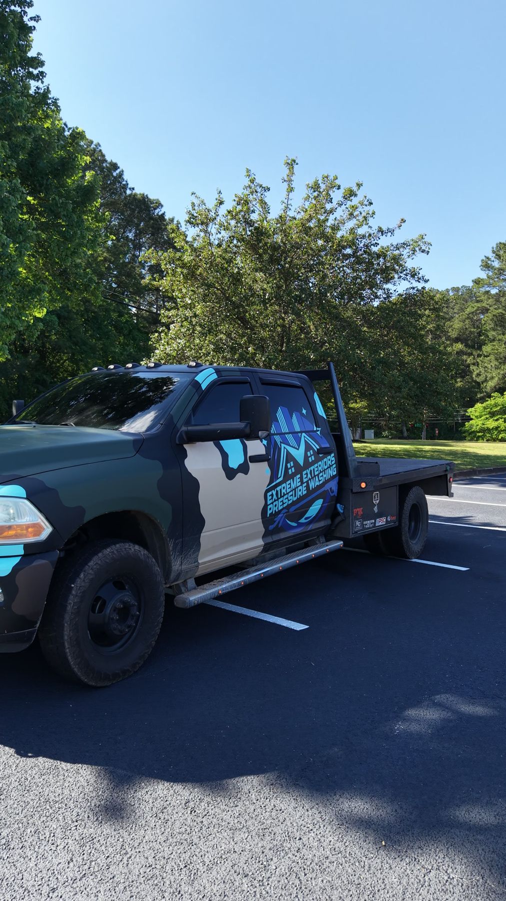 Extreme Exteriors truck on a job site